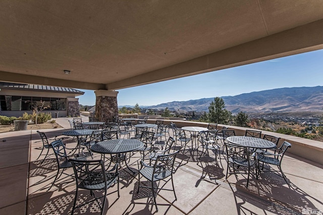 view of patio / terrace with a mountain view