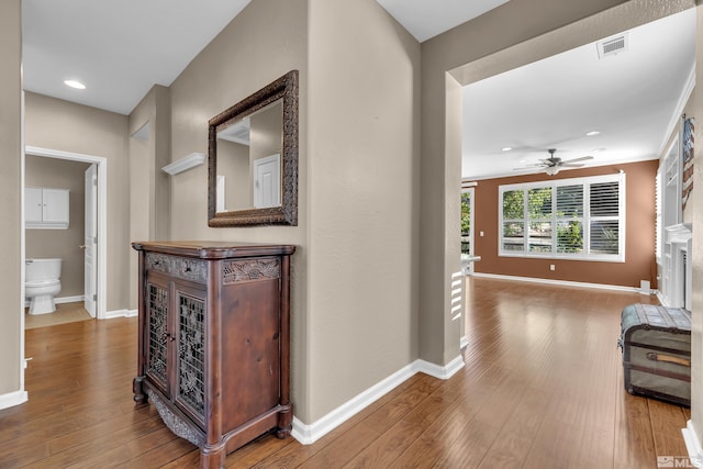 corridor featuring hardwood / wood-style flooring