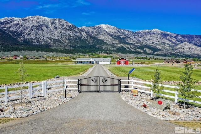 property view of mountains featuring a rural view