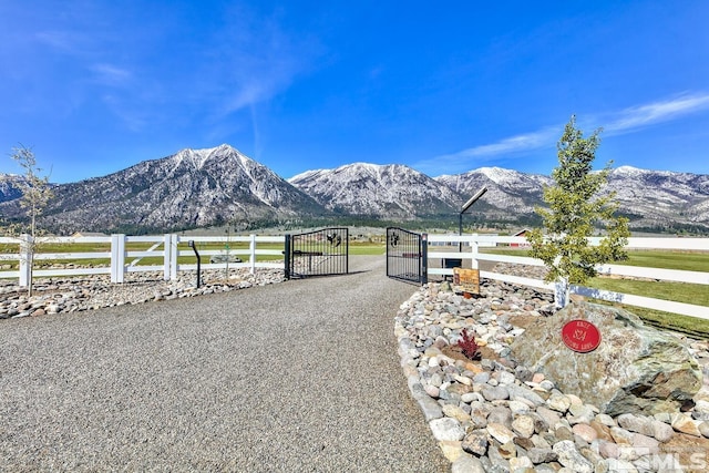 property view of mountains featuring a rural view