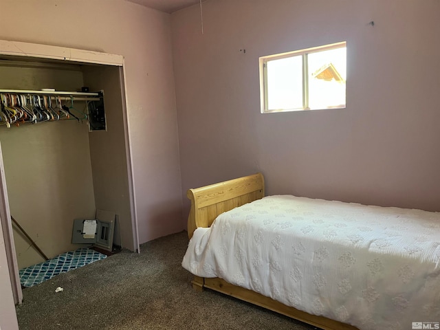 carpeted bedroom featuring a closet