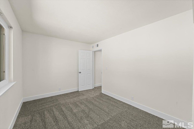 view of carpeted spare room