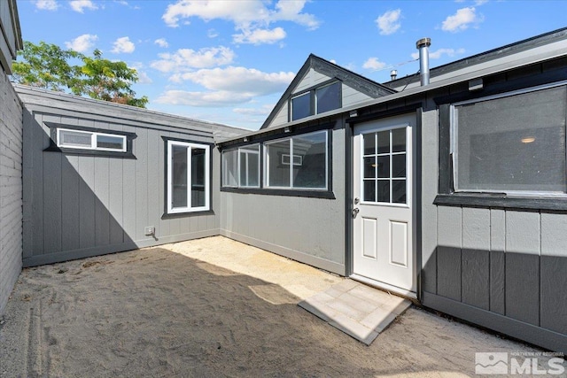 exterior space with a storage shed