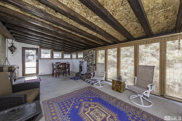 sunroom / solarium with vaulted ceiling