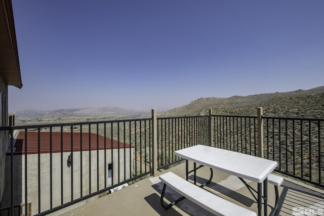 view of patio featuring a mountain view