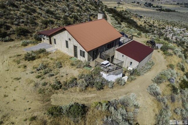 birds eye view of property with a rural view