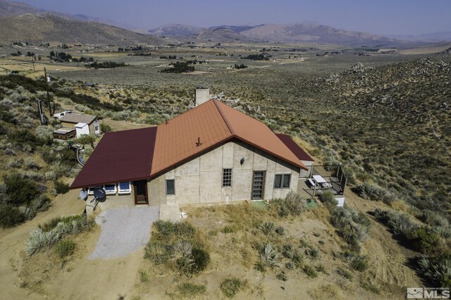 bird's eye view featuring a rural view and a mountain view