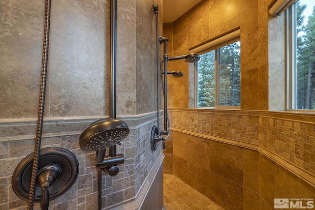 details featuring a tile shower