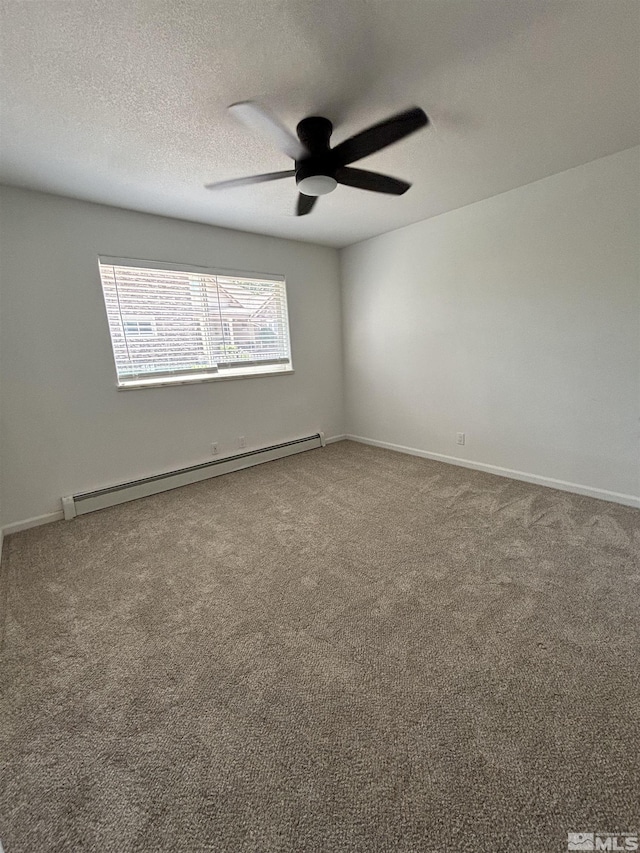 carpeted empty room with a baseboard heating unit, a textured ceiling, baseboards, and ceiling fan