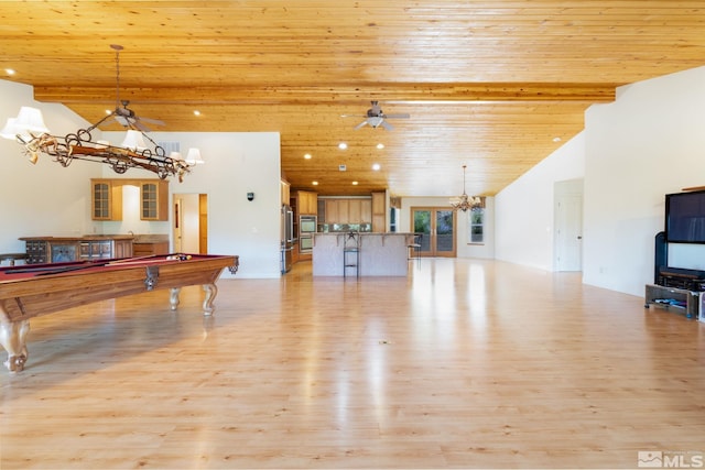 game room featuring lofted ceiling with beams, wood ceiling, and light wood-type flooring