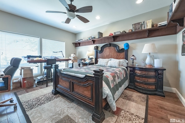 bedroom featuring ceiling fan and light wood-type flooring