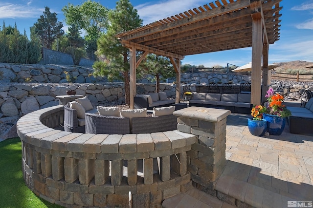 view of patio with a pergola and outdoor lounge area