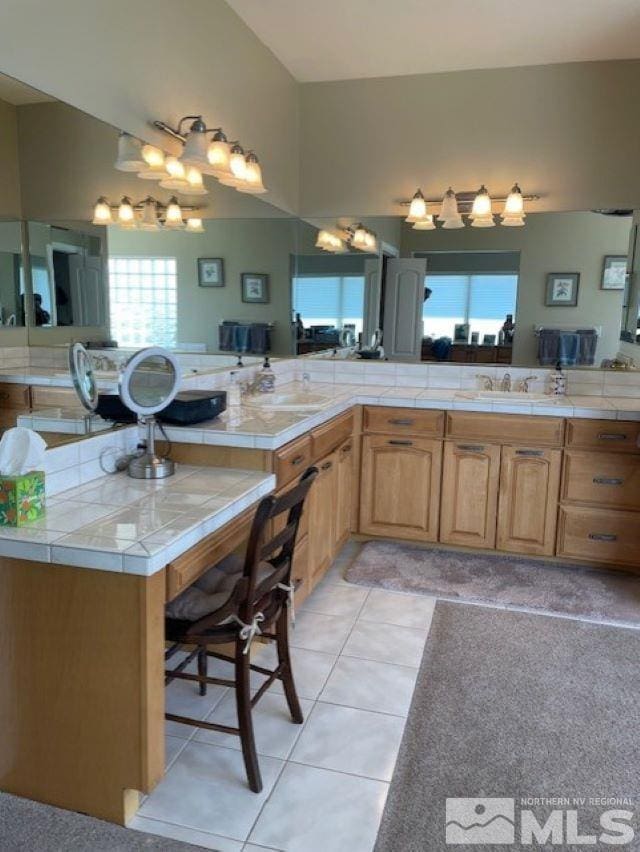 bathroom featuring sink and tile patterned floors