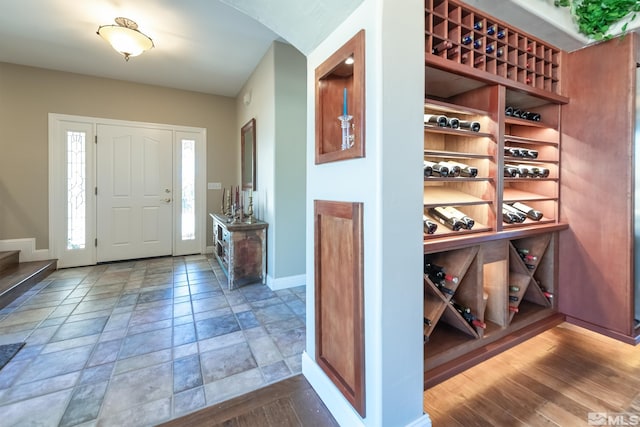 wine cellar featuring hardwood / wood-style flooring