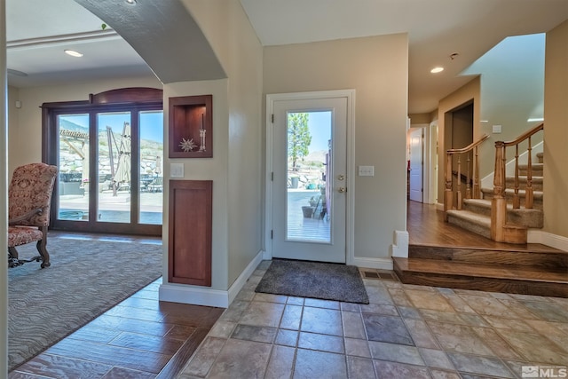 entrance foyer featuring wood-type flooring