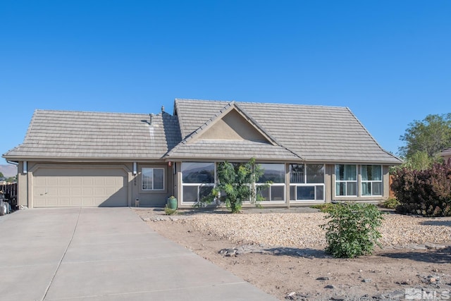 single story home with a garage