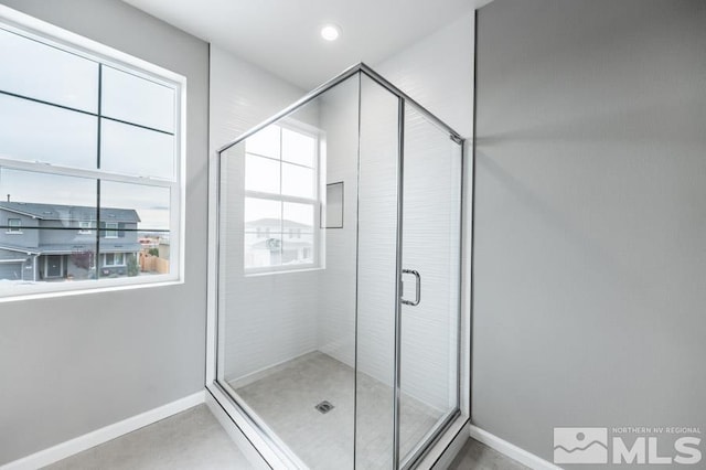 bathroom with an enclosed shower