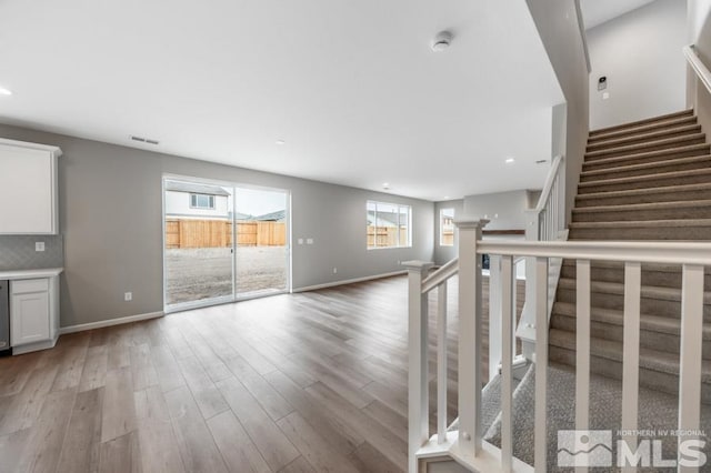 interior space with hardwood / wood-style floors