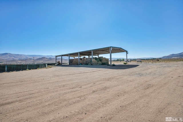 exterior space featuring a mountain view and a rural view