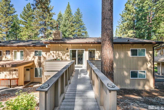 rear view of house with a deck