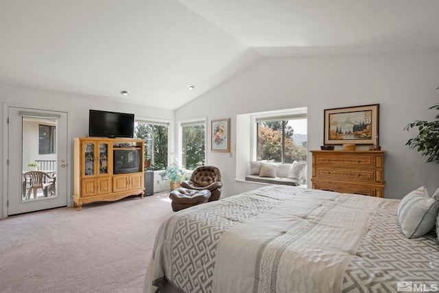 carpeted bedroom featuring vaulted ceiling and access to exterior