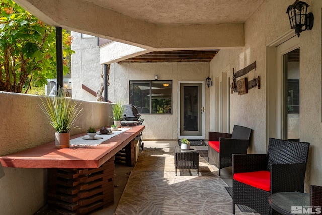 view of patio / terrace with outdoor lounge area and a bar