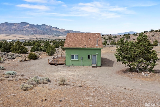 exterior space featuring a mountain view