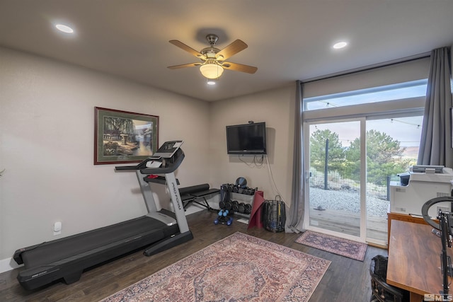 workout room with recessed lighting, ceiling fan, and wood finished floors