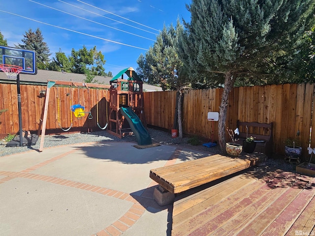 view of play area with a wooden deck