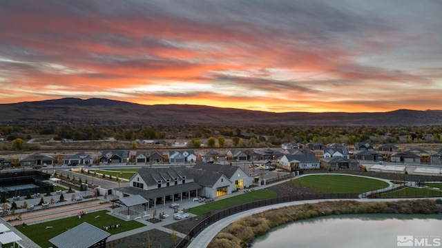 drone / aerial view with a mountain view and a residential view