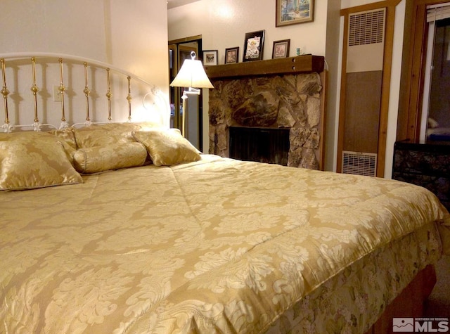 bedroom with a fireplace