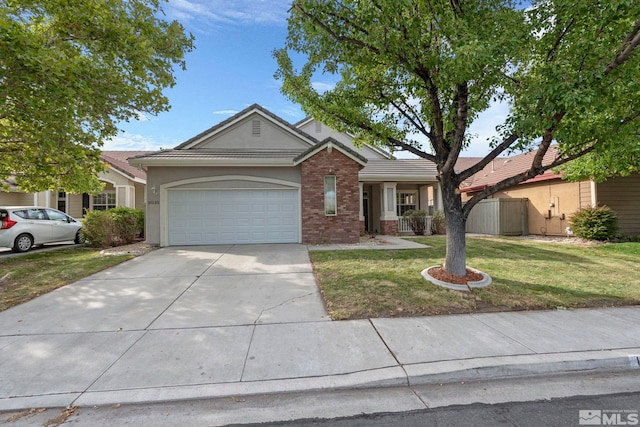 ranch-style house with a garage and a front yard