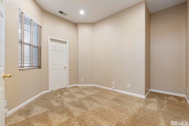 empty room with carpet floors