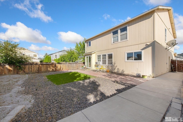 back of house featuring a patio area