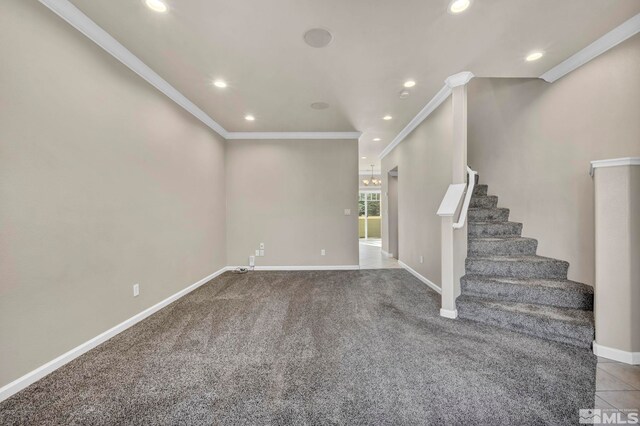 unfurnished room featuring carpet and ornamental molding