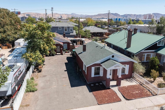 drone / aerial view featuring a mountain view