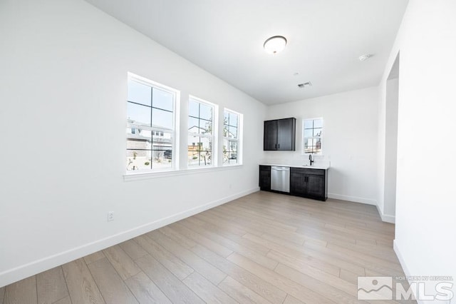 unfurnished living room featuring light wood-type flooring