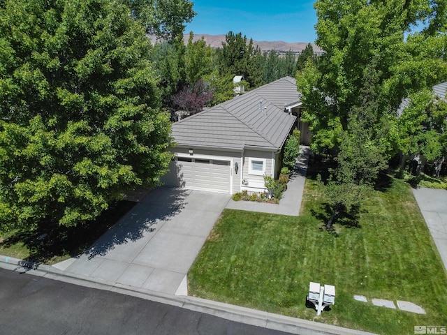 birds eye view of property featuring a mountain view