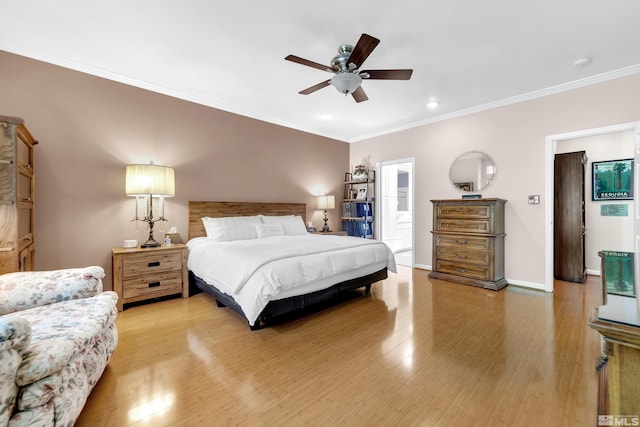 bedroom with ensuite bath, crown molding, ceiling fan, and light hardwood / wood-style floors