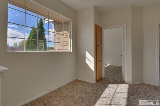 view of carpeted spare room