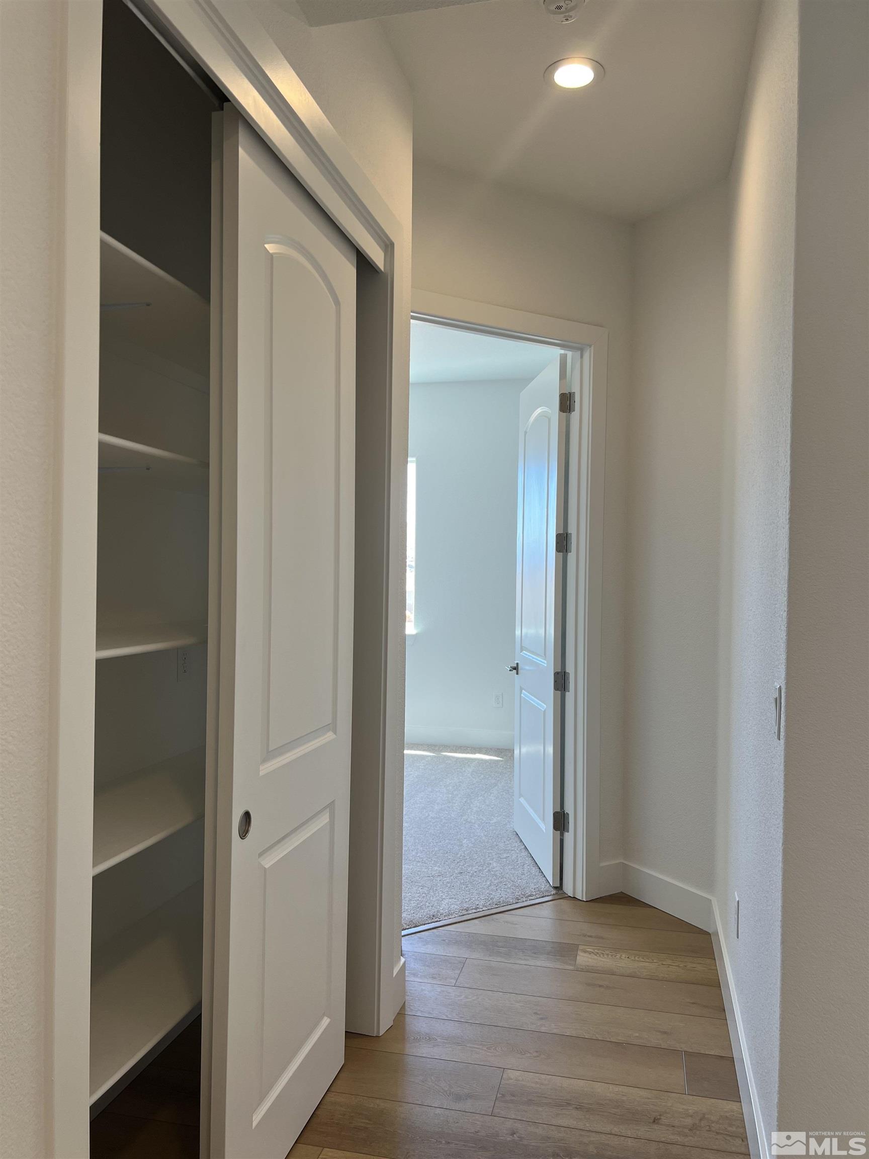 hallway featuring light hardwood / wood-style floors