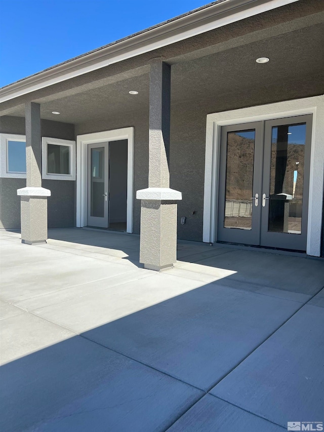 view of patio / terrace featuring french doors