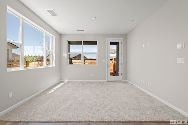 view of carpeted spare room