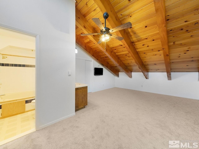 bonus room featuring vaulted ceiling with beams, ceiling fan, light carpet, and wooden ceiling