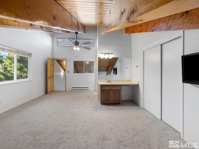 interior space featuring wooden ceiling, high vaulted ceiling, a baseboard heating unit, light colored carpet, and ceiling fan