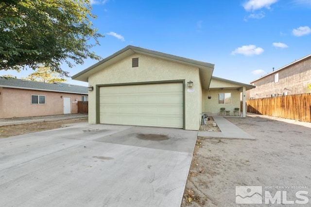 ranch-style home with a garage