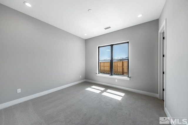 unfurnished room with carpet