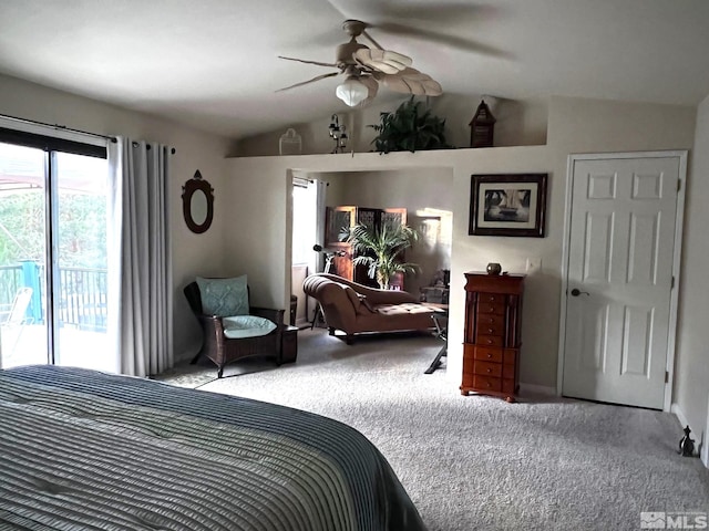 carpeted bedroom with vaulted ceiling, ceiling fan, and access to outside