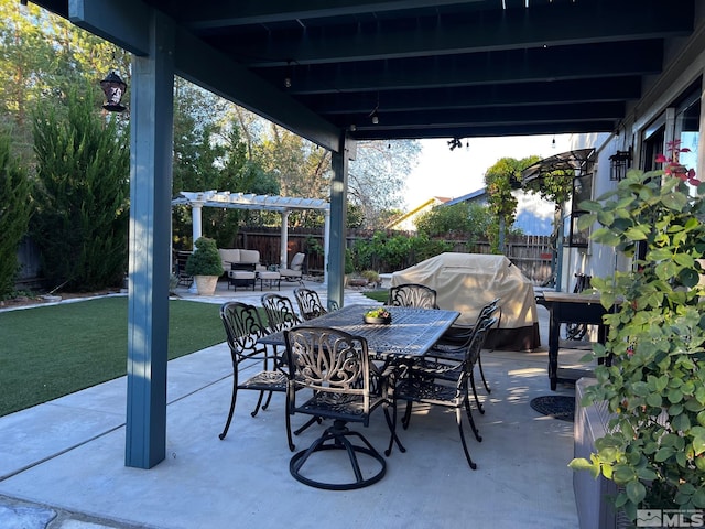 view of patio / terrace featuring a pergola and area for grilling