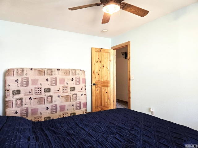 unfurnished bedroom featuring a ceiling fan